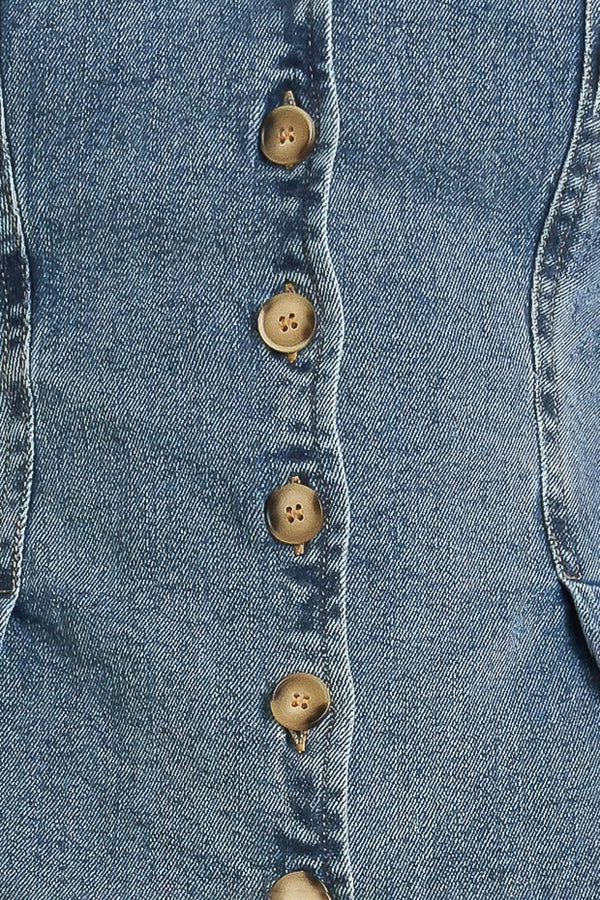 A washed denim top featuring V neckline, short sleeve, front button sown and peplum. Matching pant FP1946

Details:

Self: 99% Cotton 1% Spandex

Size & Fit

-Model is 5`8" And Wearing Size Small
-Measurements Taken From Size Small
-Approx. Length: 23"