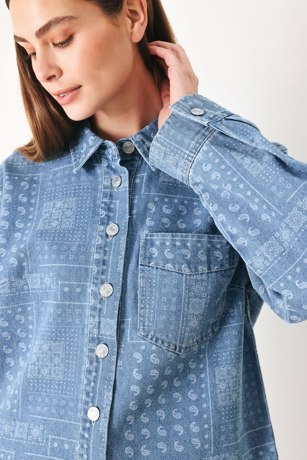 Woman wearing a blue bandana patterned denim jacket with front closure | FREEMARKET | Flying Tomato