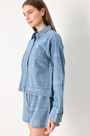 Woman wearing a blue bandana patterned denim jacket with front closure | FREEMARKET | Flying Tomato