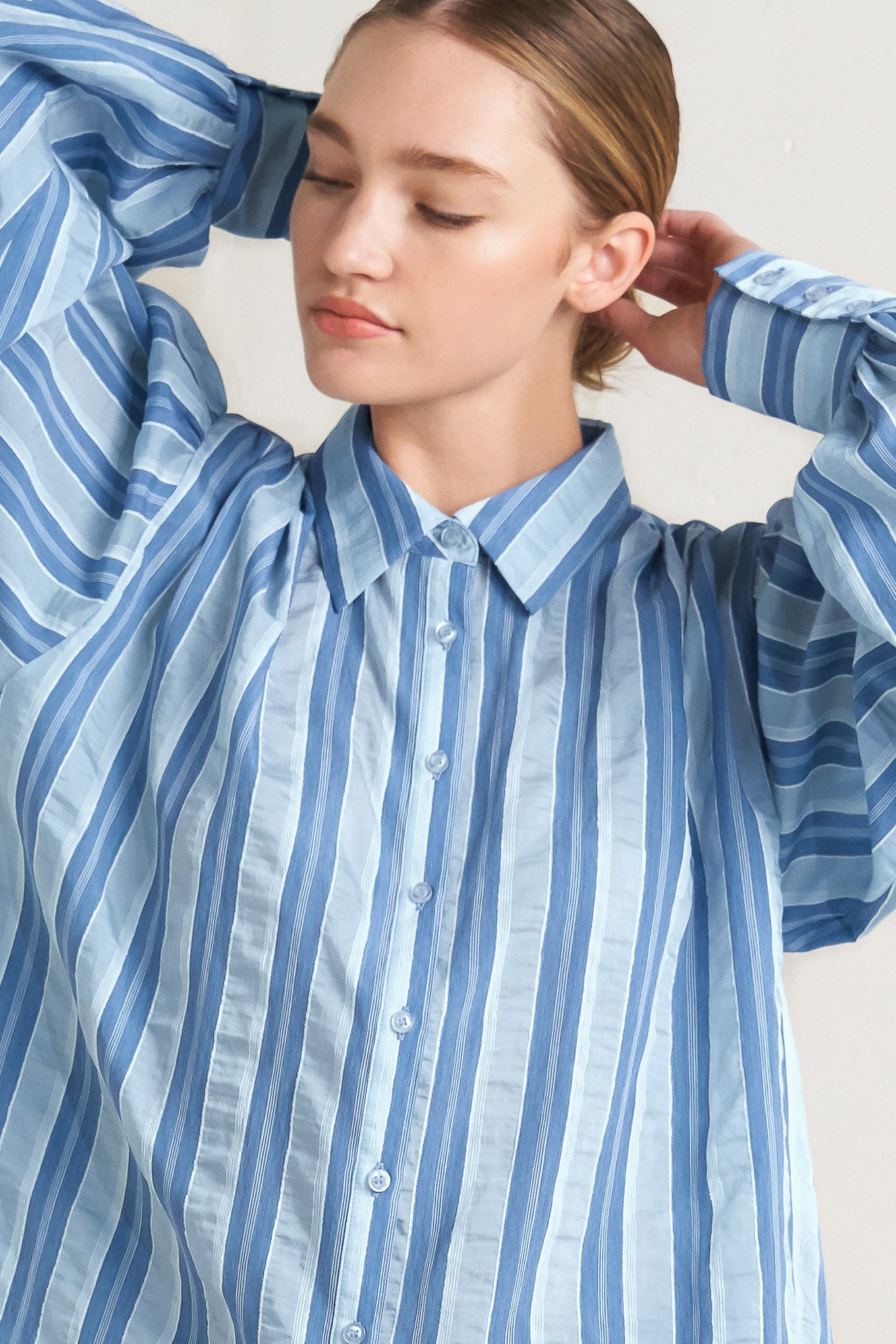 Blue striped long-sleeve button-front blouse