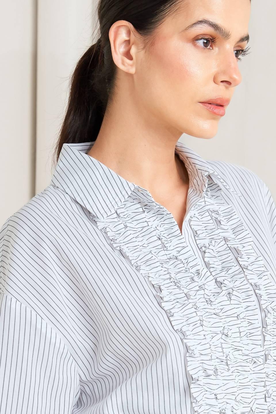 DAYLIGHT EDGE WOVEN TOP.