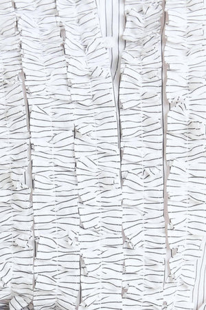 DAYLIGHT EDGE WOVEN TOP.