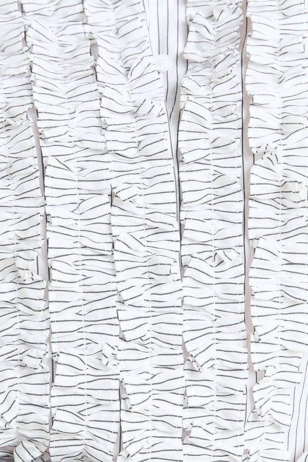 DAYLIGHT EDGE WOVEN TOP.