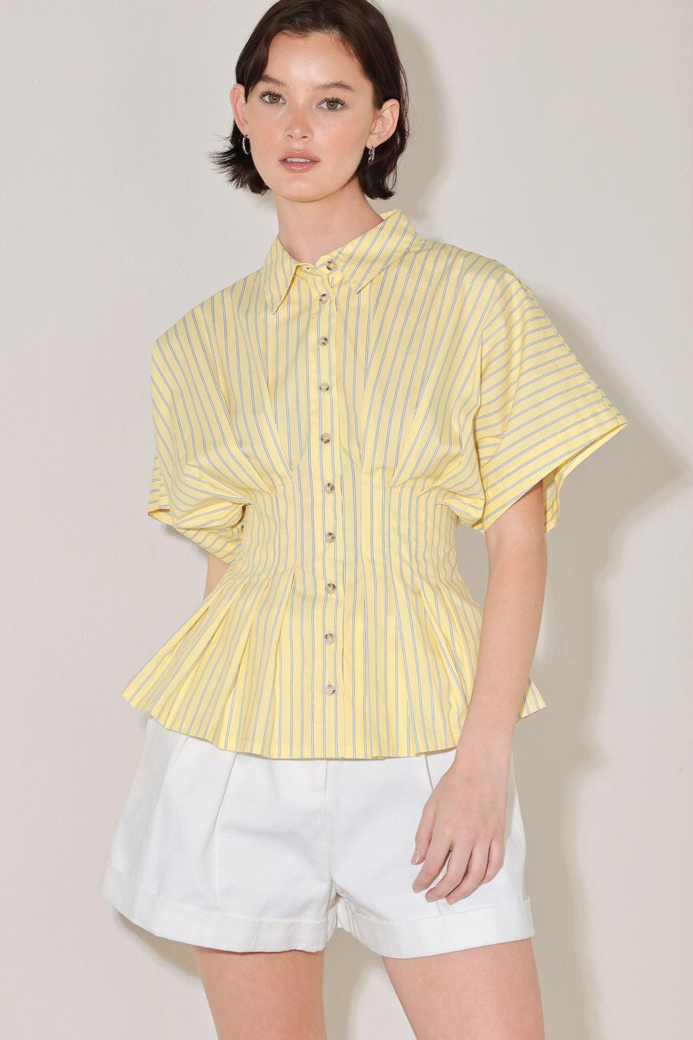 BUTTER MODE ACTIVATED WOVEN TOP.