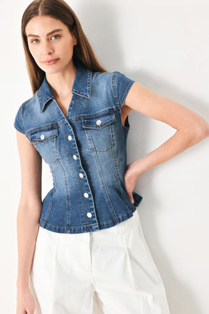 Woman wearing a denim top with collar, cap sleeve and front button down | FREEMARKET | Flying Tomato