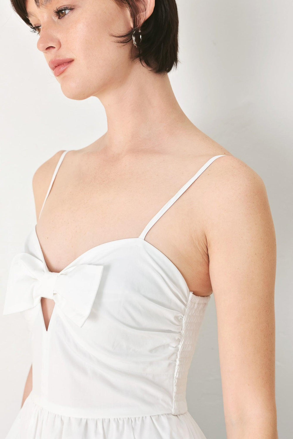 SUNSET BOW WHITE WOVEN TOP.