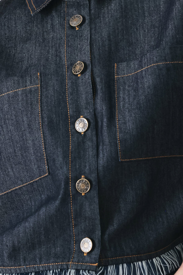 Close up of a dark denim crop jacket featuring short sleeve with fray edge and button down closure | FREEMARKET