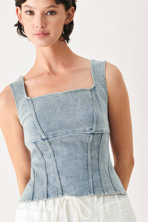 Woman wearing a denim corset denim top with square neckline and back zipper closure | FREEMARKET