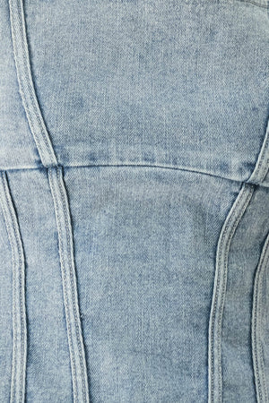 Woman wearing a denim corset denim top with square neckline and back zipper closure | FREEMARKET