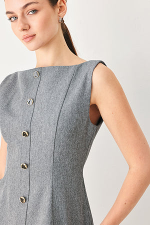 A woman wearing a gray sleeveless button-front top featuring wide neckline | FREEMARKET