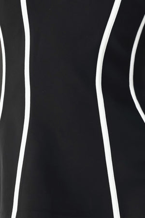 A woman wearing a strapless black corset-style top with bold white vertical stripes | FREEMARKET