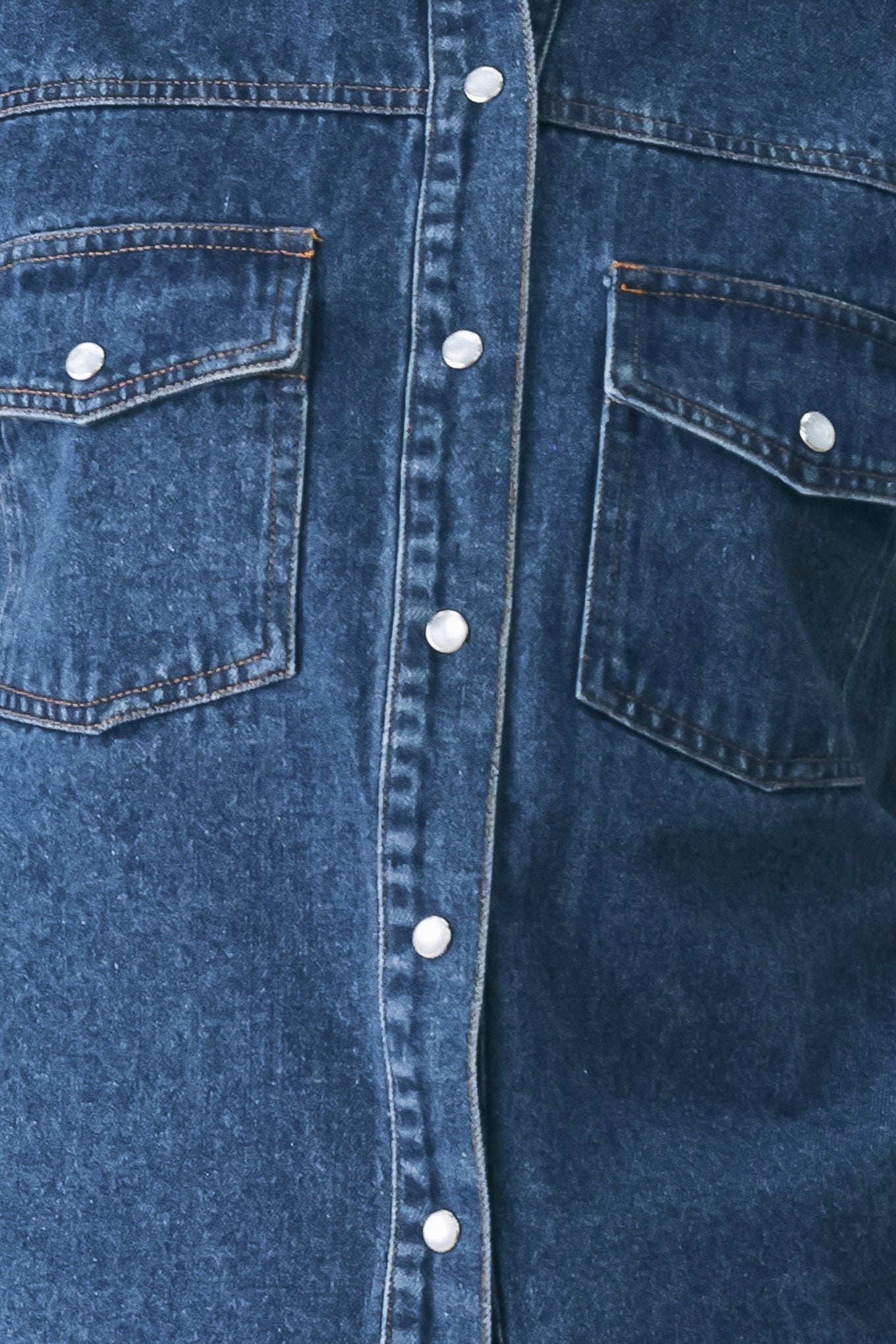 A woman wearing a dark blue denim button-up shirt jacket with two chest pockets | FREEMARKET