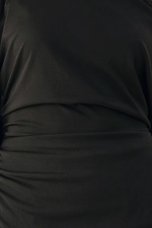 A model wearing a black asymmetrical off-the-shoulder top with black lace trim along the neckline, cuffs, and hem | FREEMARKET