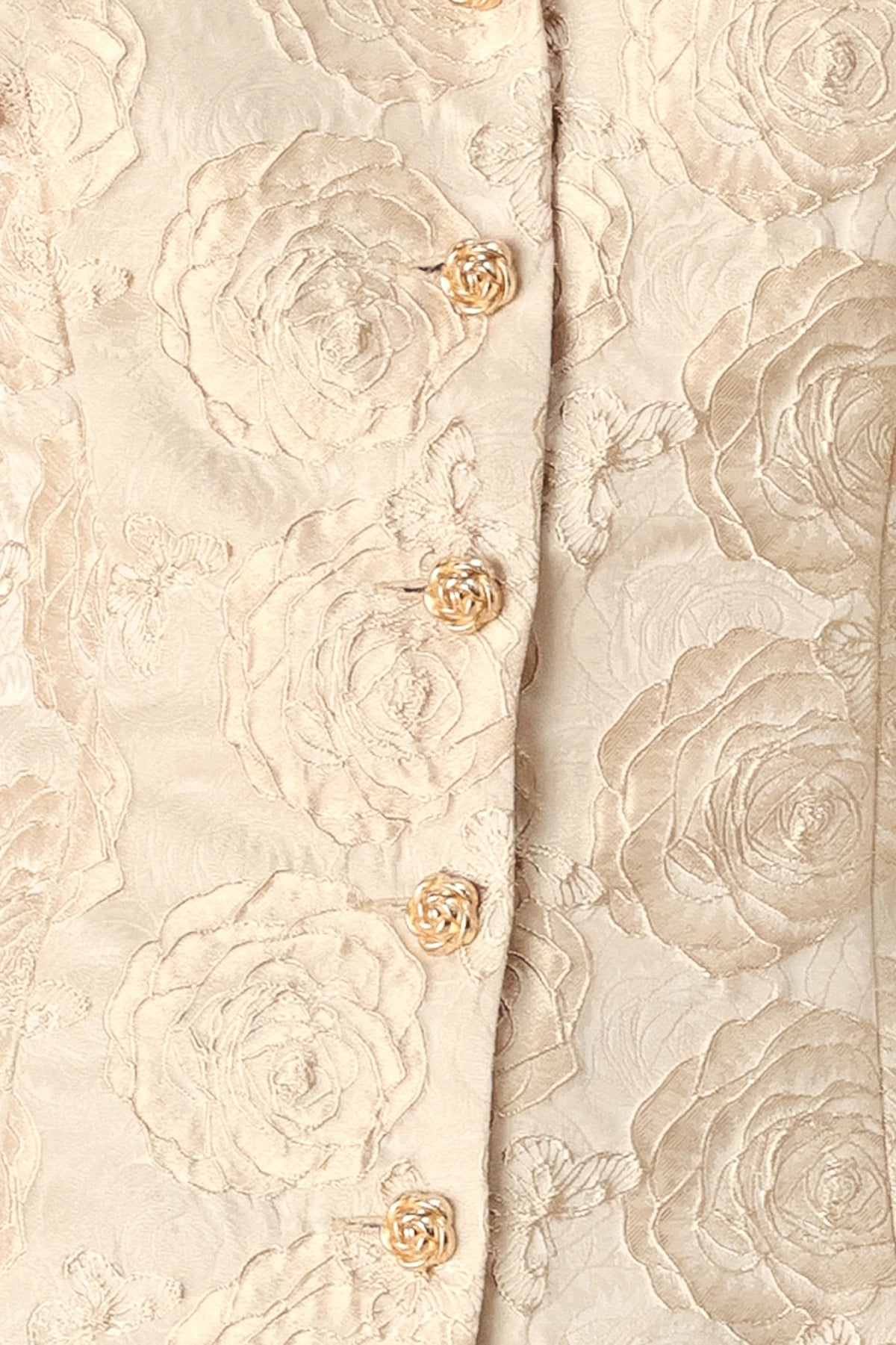 A woman wearing a beige gold jacquard corset-style blouse with puff sleeves and a sweetheart neckline | FREEMARKET