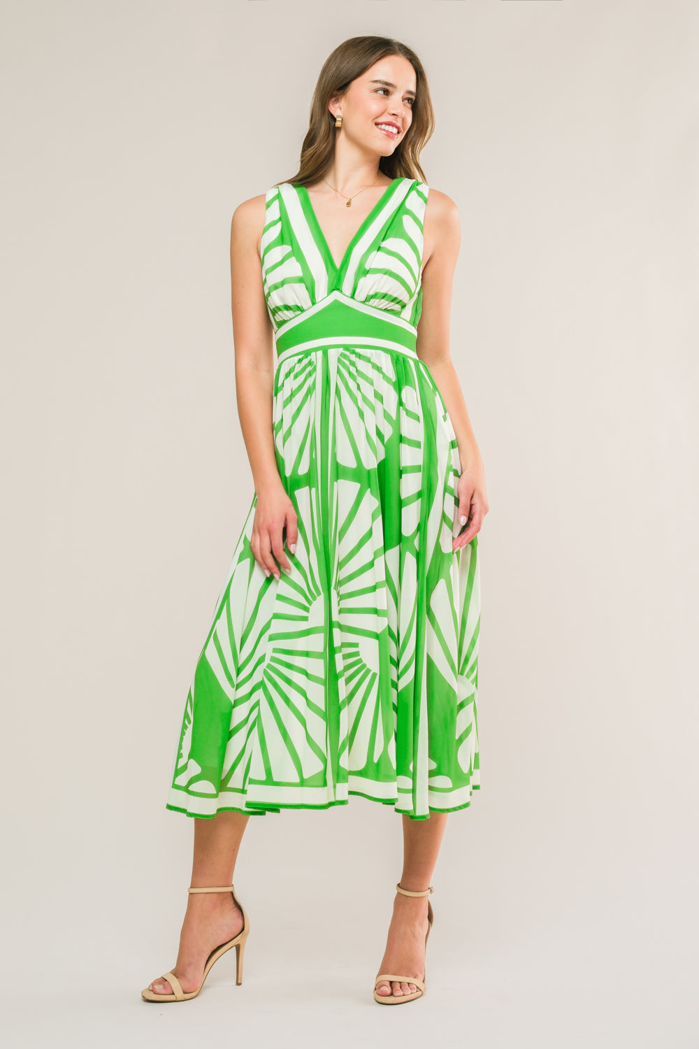 A printed woven midi dress featuring V neckline, sleeveless, waist yoke and smocked back waist band
Details:
Self : 100% Polyester
Lining : 100% Polyester
Size & Fit
- Model is 5`8" And Wearing Size Small
- Measurements Taken From Size Small
- Approx. length: 45"