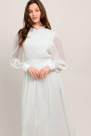 
A textured woven midi dress featuring high neckline with ruffled edge, long sleeve with cuff, full skirt and back zipper closure

Details:

Self : 100% Polyester
Lining: 100% Polyester

Size &amp; Fit

- Model is 5`7" And Wearing Size Small
- Measurements Taken From Size Small
- Approx. Length: 48"