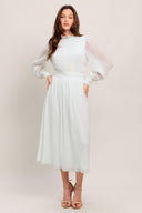 
A textured woven midi dress featuring high neckline with ruffled edge, long sleeve with cuff, full skirt and back zipper closure

Details:

Self : 100% Polyester
Lining: 100% Polyester

Size &amp; Fit

- Model is 5`7" And Wearing Size Small
- Measurements Taken From Size Small
- Approx. Length: 48"