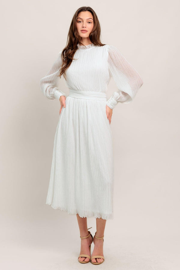 
A textured woven midi dress featuring high neckline with ruffled edge, long sleeve with cuff, full skirt and back zipper closure

Details:

Self : 100% Polyester
Lining: 100% Polyester

Size &amp; Fit

- Model is 5`7" And Wearing Size Small
- Measurements Taken From Size Small
- Approx. Length: 48"