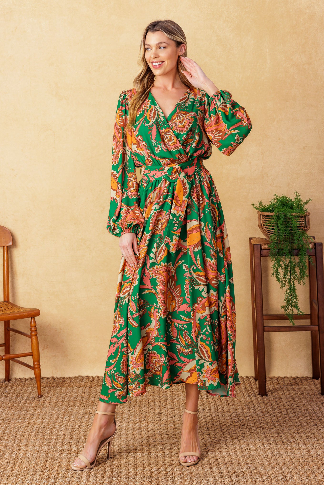 
A printed woven midi dress featuring surplice neckline, long puff sleeve, elasticized waist, self belt and full skirt

Details:

Self : 100% Polyester
Lining : 100% Polyester

Size &amp; Fit

- Model is 5`9" And Wearing Size Small
- Measurements Taken From Size Small
- Approx. Length: 52"