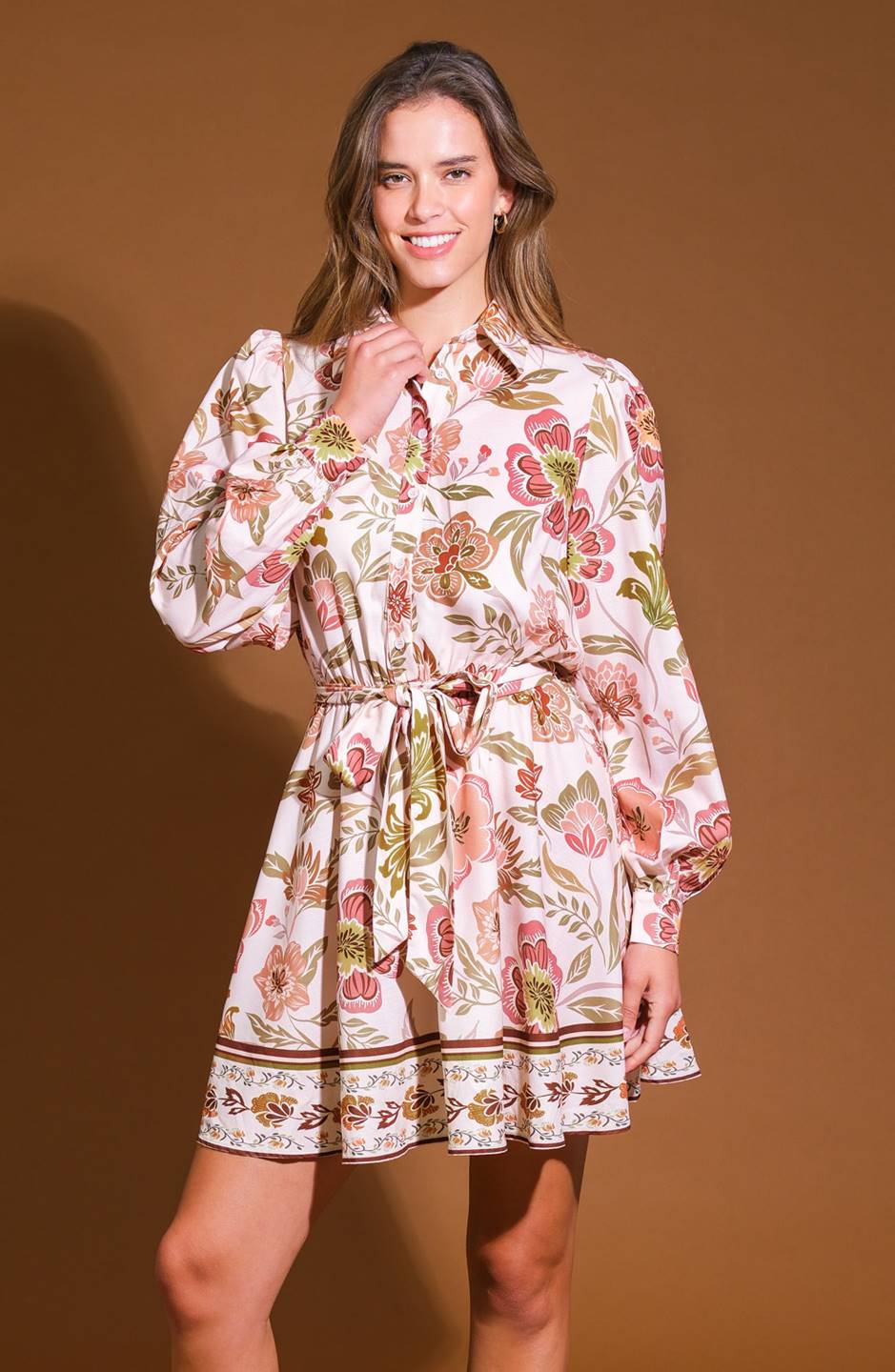 
A printed woven mini dress featuring shirt collar, long sleeve, button down, elasticized waist, self sash tie and full skirt

Details

Self : 100% Polyester

Size &amp; Fit

- Model is 5`9" and wearing size Small
- Measurements taken from size Small
- Approx. Length: 36"