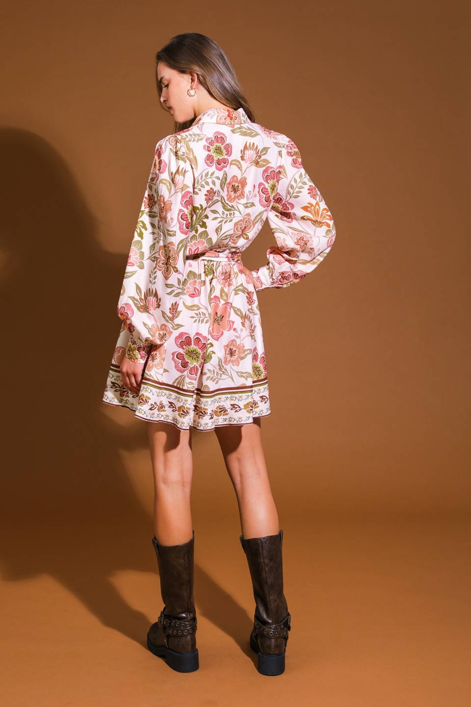 
A printed woven mini dress featuring shirt collar, long sleeve, button down, elasticized waist, self sash tie and full skirt

Details

Self : 100% Polyester

Size &amp; Fit

- Model is 5`9" and wearing size Small
- Measurements taken from size Small
- Approx. Length: 36"