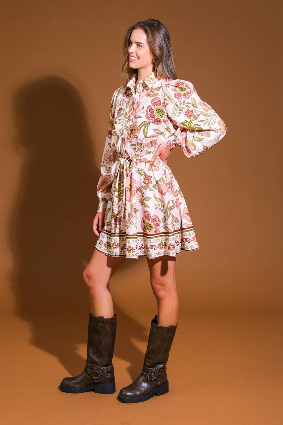 
A printed woven mini dress featuring shirt collar, long sleeve, button down, elasticized waist, self sash tie and full skirt

Details

Self : 100% Polyester

Size &amp; Fit

- Model is 5`9" and wearing size Small
- Measurements taken from size Small
- Approx. Length: 36"