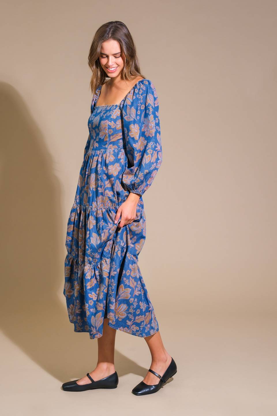 A printed denim midi dress featuring a square neckline, 3/4 sleeves, tiered skirt and smocked back bodice

Details:

Self : 100% Cotton

Size &amp; Fit

- Model is 5`8" And Wearing Size Small
- Measurements Taken From Size Small
- Approx. Length: 47"