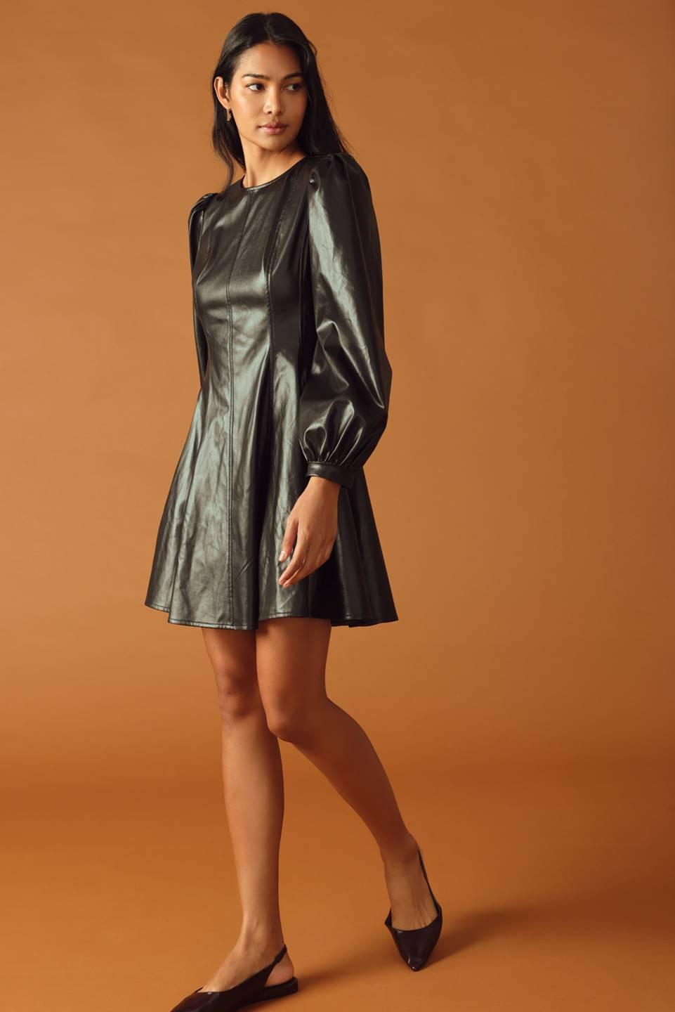 CHANGE OF PACE FAUX LEATHER MINI DRESS.