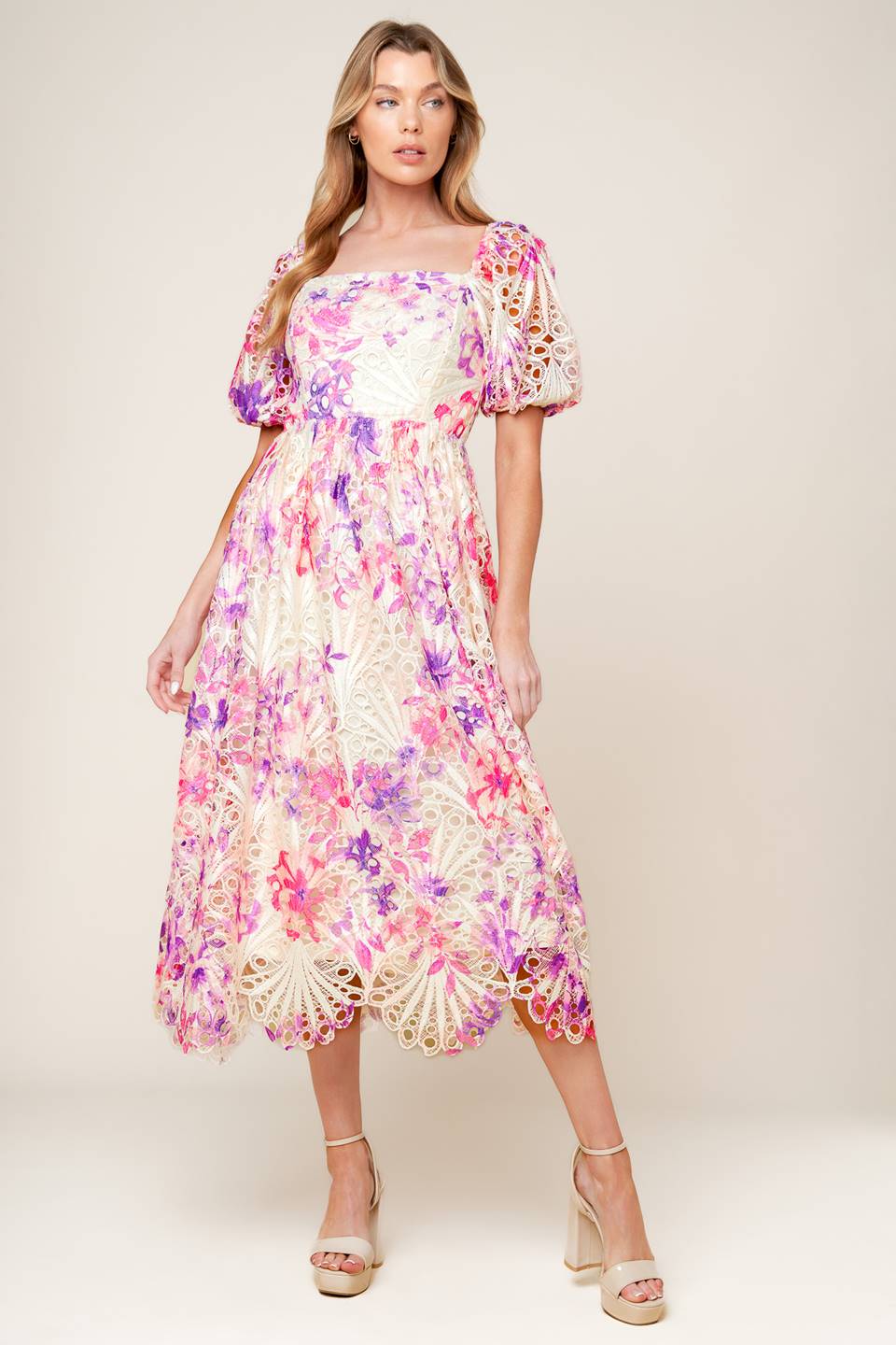 A printed woven lace midi dress featuring square neckline, short puff sleeve and back zipper closure