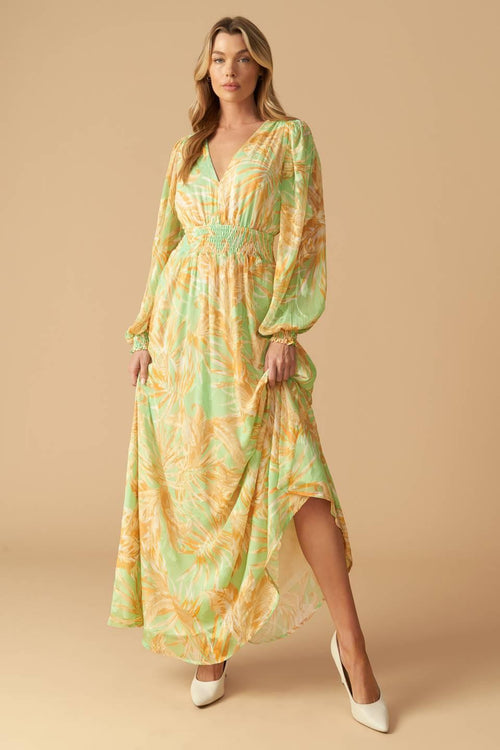 
A printed woven maxi dress featuring V neckline, long sleeve with smocked cuff and smocked waistband

Details:

Self : 100% Polyester
Lining : 100% Polyester

Size &amp; Fit

- Model is 5`10" And Wearing Size Small
- Measurements Taken From Size Small
- Approx. Length: 60"