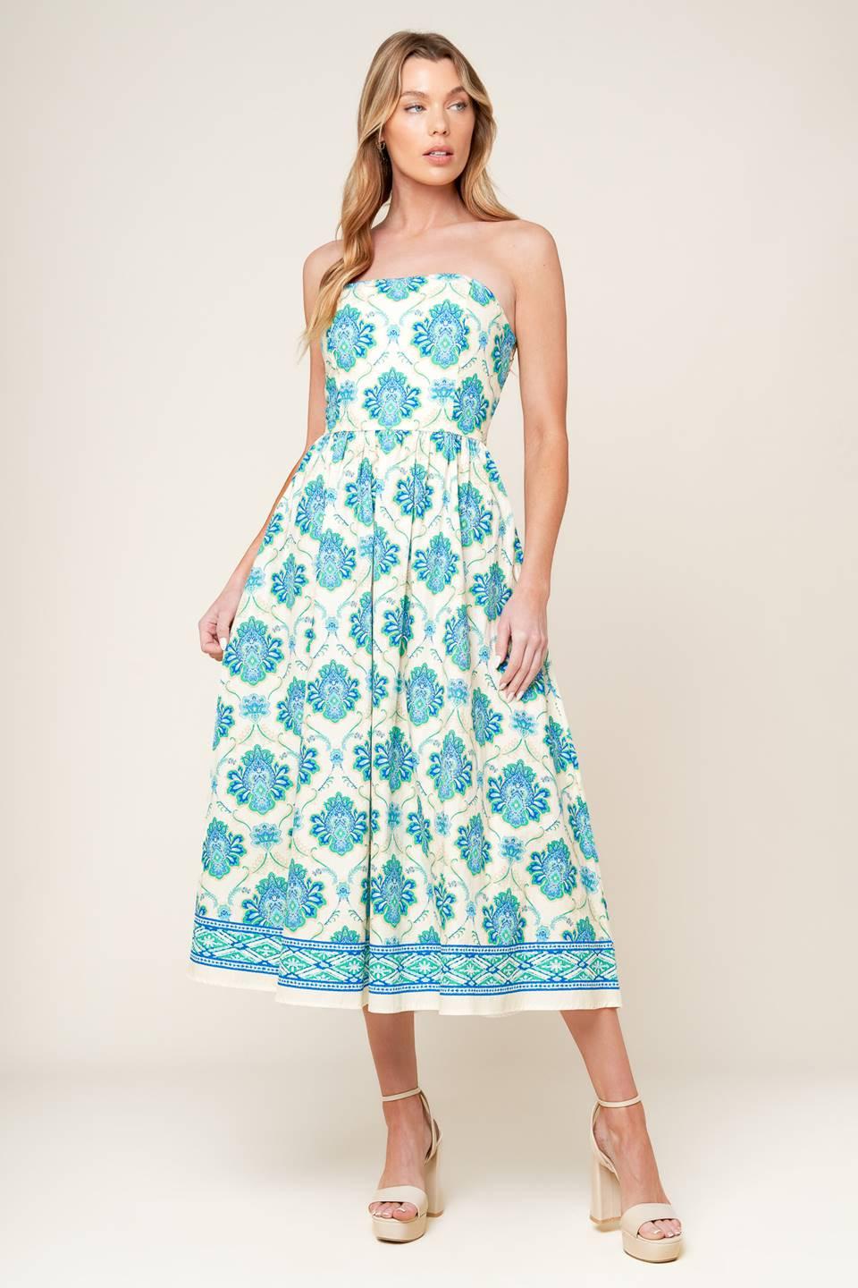 A printed woven midi dress featuring strapless neckline, full skirt and smocked back bodice