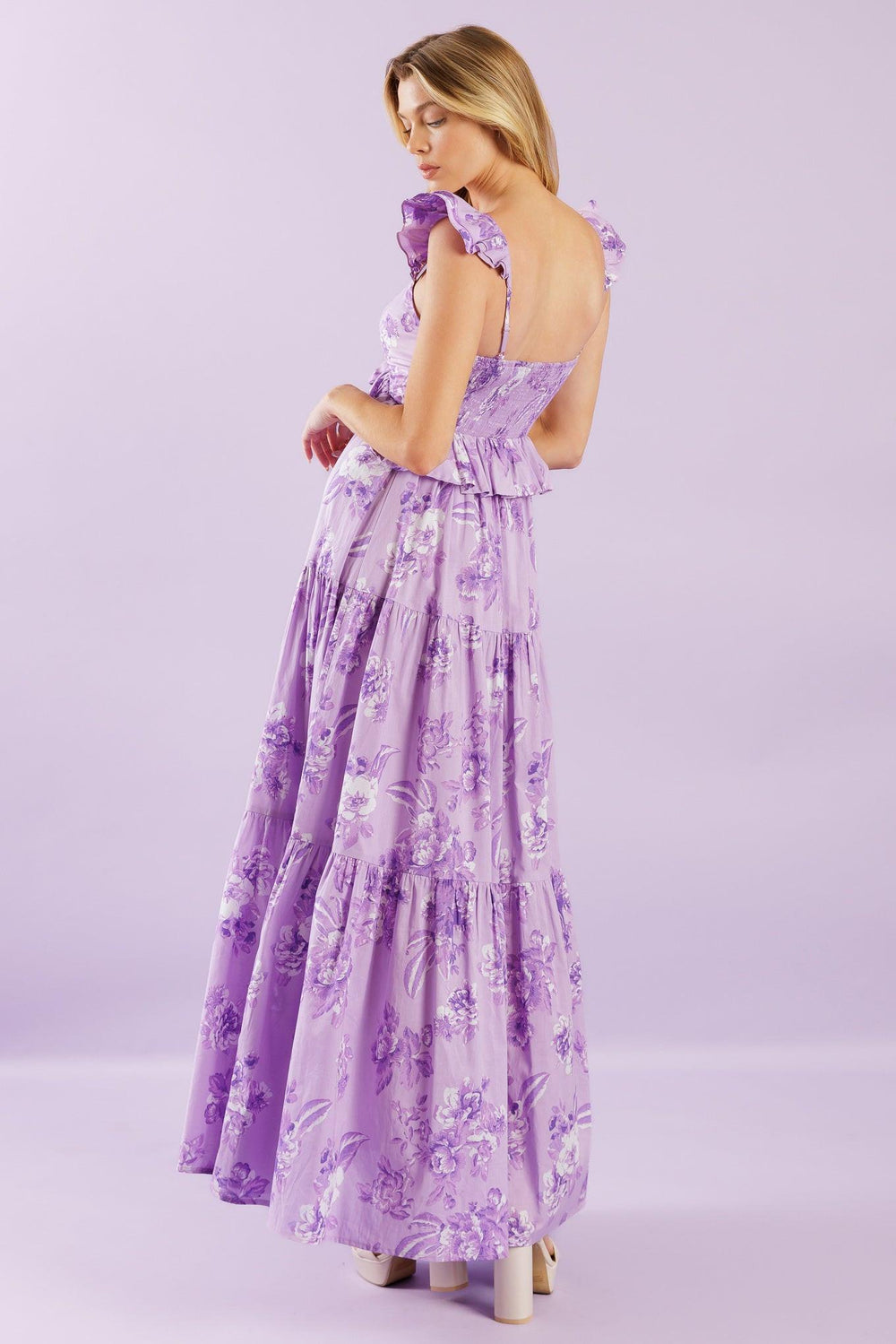 A playful woven maxi dress with a cami-style top, double layered sleeves, and a ruffled empire waist. Its tiered skirt and smocked back bodice add a fun and flowy touch.


Details:

Self : 100% Cotton
Lining : 100% Cotton

Size &amp; Fit

- Model is 5`8" And Wearing Size Small
- Measurements Taken From Size Small
- Approx. Length: 59" FLYING TOMATO