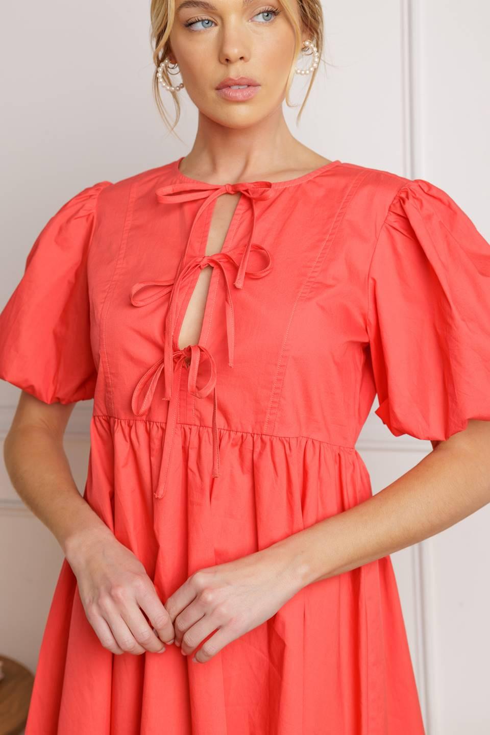 Red woven mini dress featuring puff sleeves and front tie details | Flying Tomato