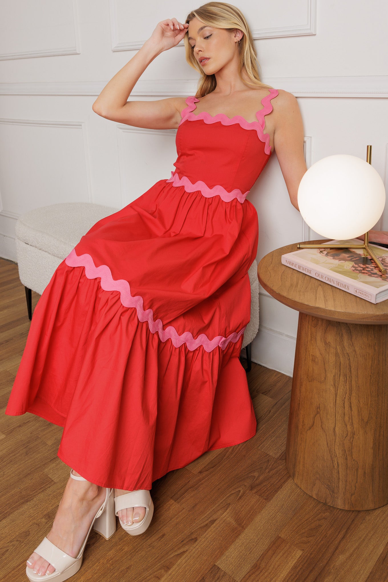 A solid woven midi dress featuring a straight neckline, ric rac trimmed, ruffled hemline and smock back bodice

Details:

Self: 100% Cotton

Size &amp; Fit

- Model is 5`10" And Wearing Size Small
- Measurements Taken From Size Small
- Approx. Length: 51"