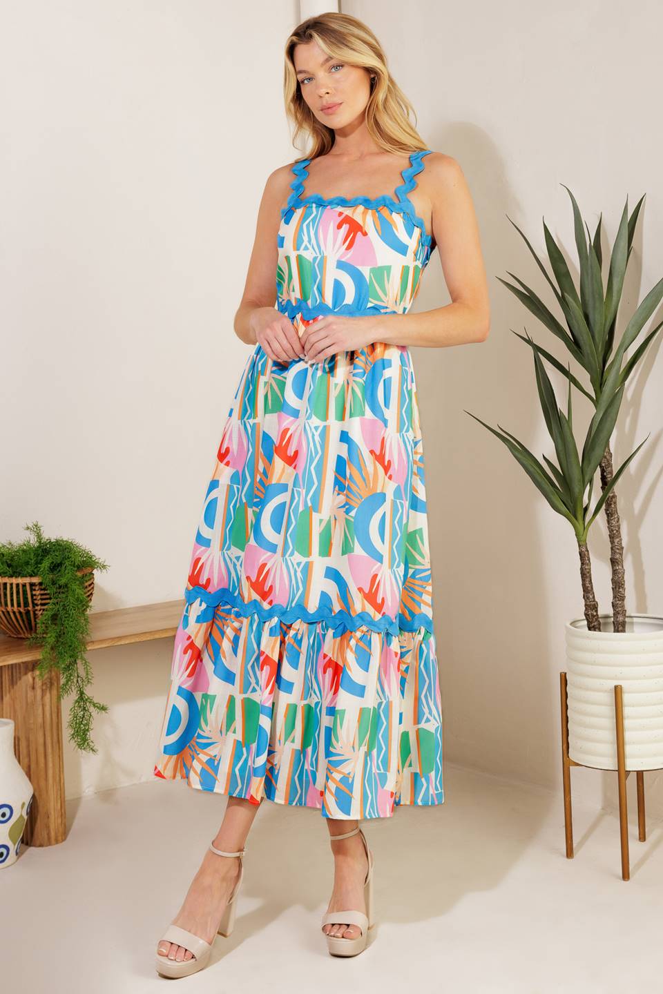 
A printed woven midi dress featuring a straight neckline, ric rac ribbon strap/trim, ruffled hemline ,and back zipper closure

Details:

Self: 100% Polyester&nbsp;
Lining: 100% Polyester

Size &amp; Fit

- Model is 5`10" And Wearing Size Small
- Measurements Taken From Size Small
- Approx. Length: 52"