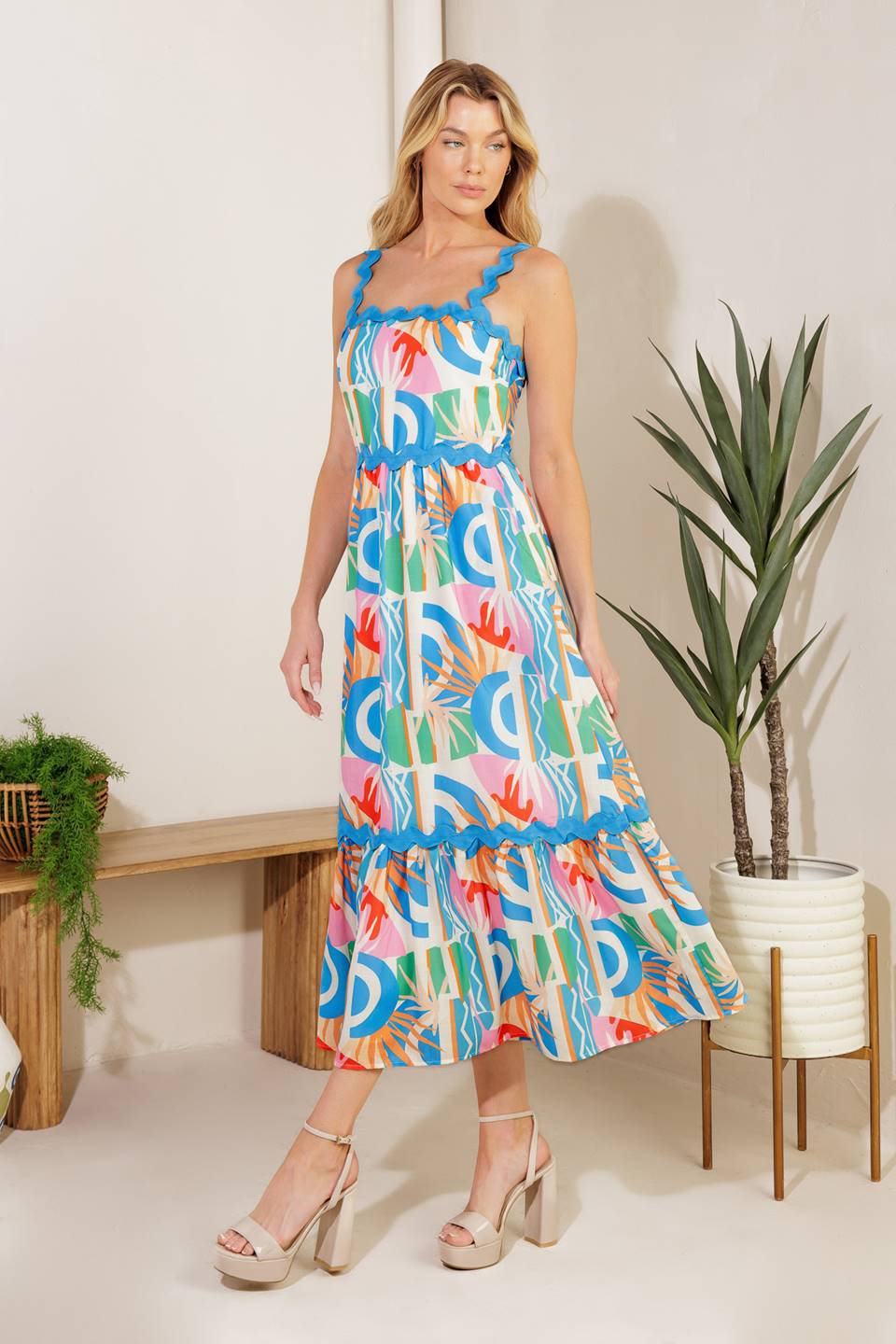 
A printed woven midi dress featuring a straight neckline, ric rac ribbon strap/trim, ruffled hemline ,and back zipper closure

Details:

Self: 100% Polyester&nbsp;
Lining: 100% Polyester

Size &amp; Fit

- Model is 5`10" And Wearing Size Small
- Measurements Taken From Size Small
- Approx. Length: 52"