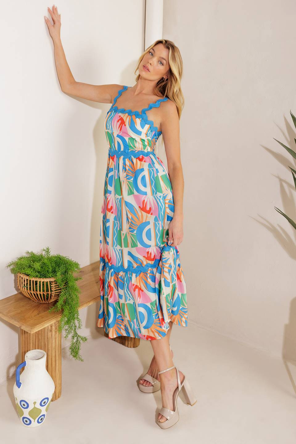 
A printed woven midi dress featuring a straight neckline, ric rac ribbon strap/trim, ruffled hemline ,and back zipper closure

Details:

Self: 100% Polyester&nbsp;
Lining: 100% Polyester

Size &amp; Fit

- Model is 5`10" And Wearing Size Small
- Measurements Taken From Size Small
- Approx. Length: 52"