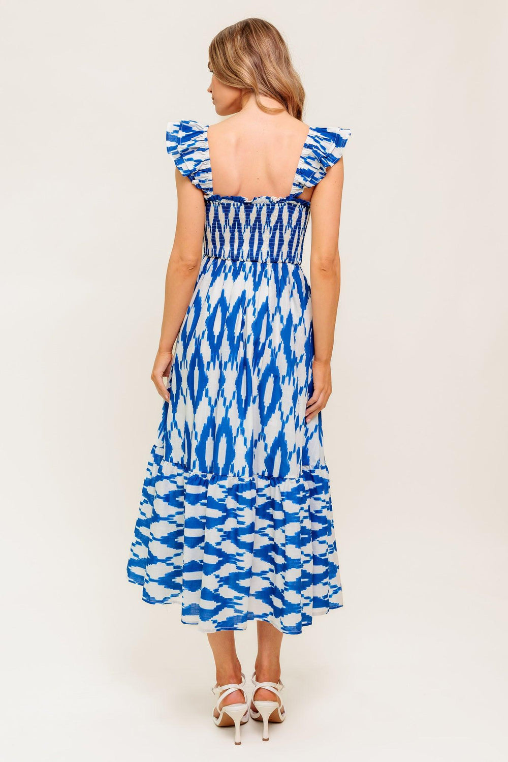 LOST IN THE DETAILS WOVEN MIDI DRESS.