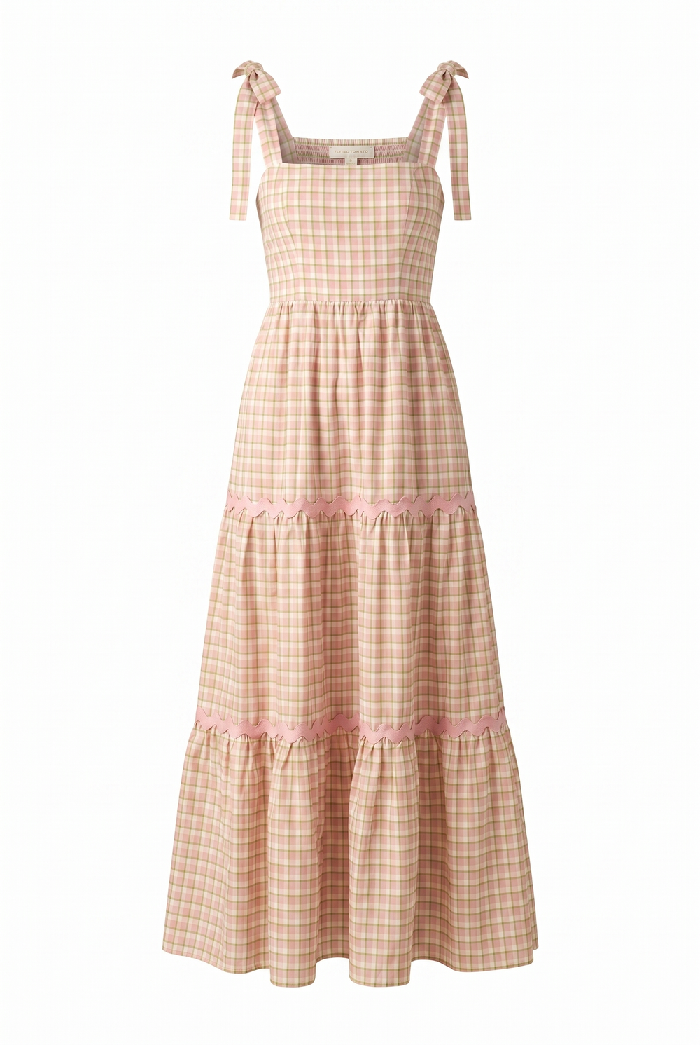 A plaid yarn dye midi dress featuring a straight neckline, shoulder ties, a tiered skirt with ric rac trim and a smocked back bodice on a white background | Flying Tomato