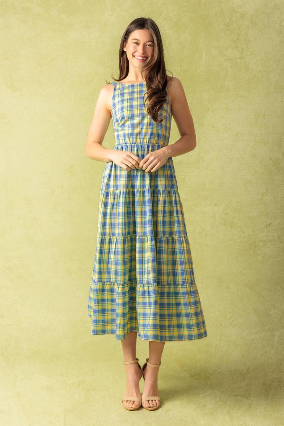 A yarn dye woven midi dress featuring round neckline, sleeveless, elasticized waist, tiered skirt, open back with back straps on a white background | Flying Tomato