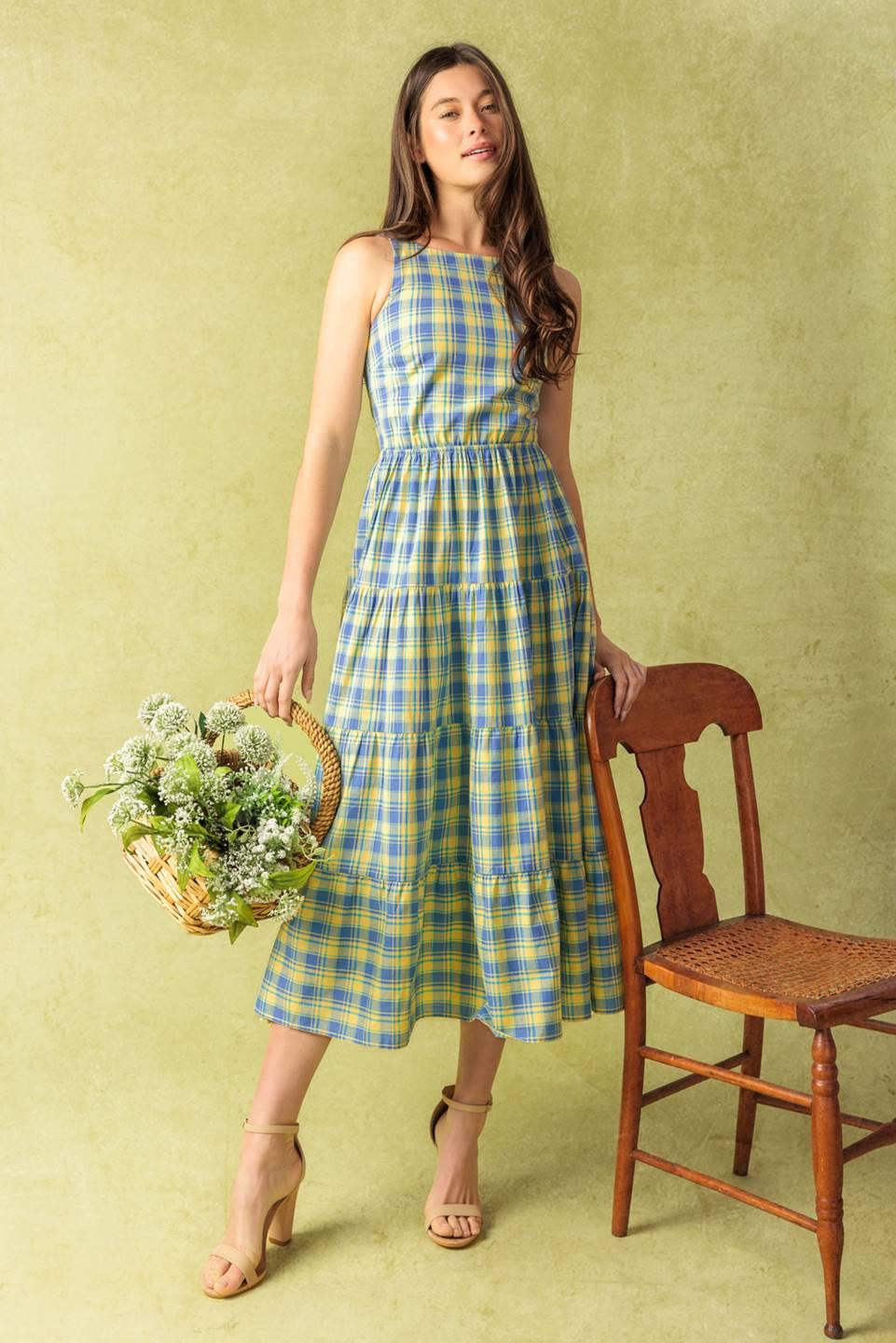 A yarn dye woven midi dress featuring round neckline, sleeveless, elasticized waist, tiered skirt, open back with back straps on a white background | Flying Tomato