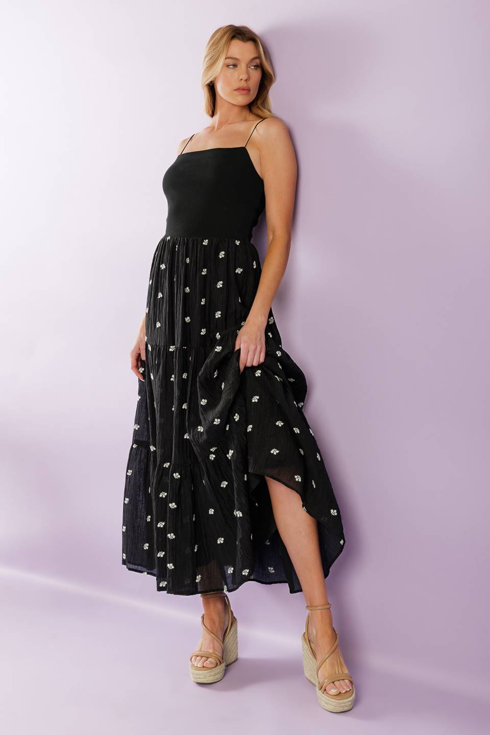 A knit and woven combination midi dress featuring knit top with straight neckline with straps, elasticized waist, &nbsp;embroidered woven skirt with ruffled hemline