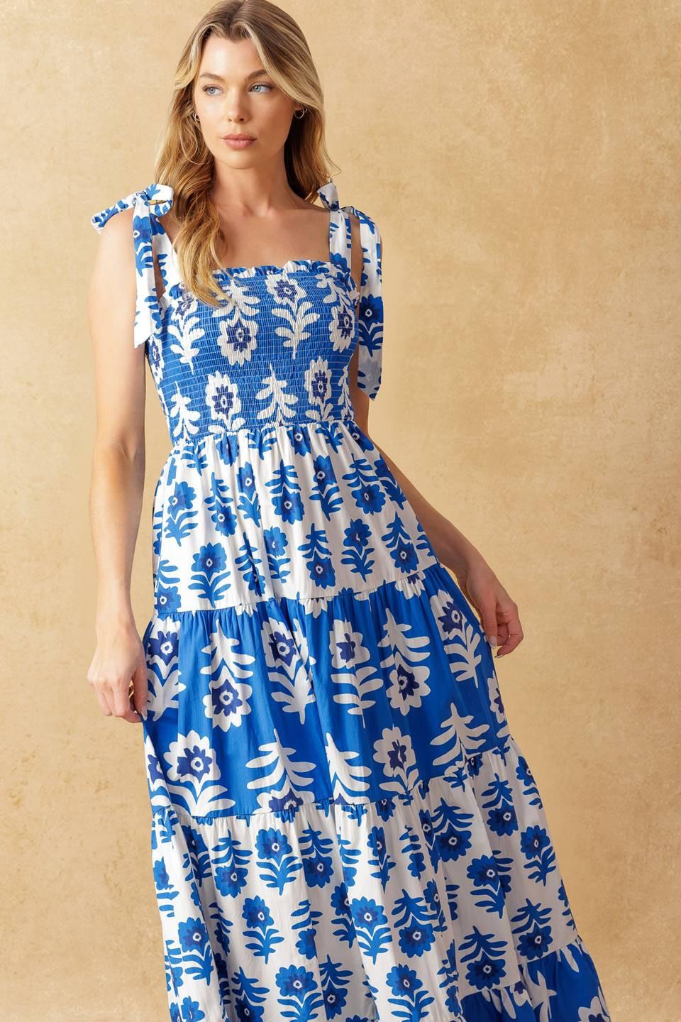 
A printed woven maxi dress featuring straight neckline, shoulder straps, smocked bodice and tiered skirt

Details:

Self : 100% Cotton
Contrast : 100% Cotton

Size &amp; Fit

- Model is 5`10" And Wearing Size Small
- Measurements Taken From Size Small
- Approx. Length: 59"