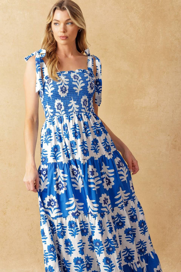 
A printed woven maxi dress featuring straight neckline, shoulder straps, smocked bodice and tiered skirt

Details:

Self : 100% Cotton
Contrast : 100% Cotton

Size &amp; Fit

- Model is 5`10" And Wearing Size Small
- Measurements Taken From Size Small
- Approx. Length: 59"