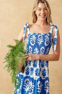 
A printed woven maxi dress featuring straight neckline, shoulder straps, smocked bodice and tiered skirt

Details:

Self : 100% Cotton
Contrast : 100% Cotton

Size &amp; Fit

- Model is 5`10" And Wearing Size Small
- Measurements Taken From Size Small
- Approx. Length: 59"