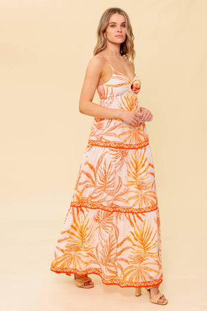 A printed woven maxi dress featuring cami bodice with O ring detail, tiered skirt and smocked back bodice