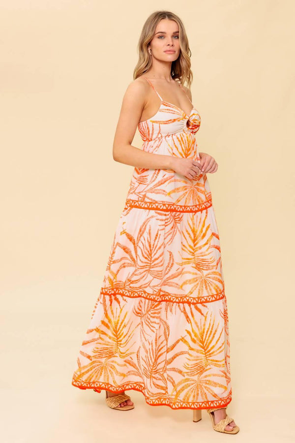 A printed woven maxi dress featuring cami bodice with O ring detail, tiered skirt and smocked back bodice