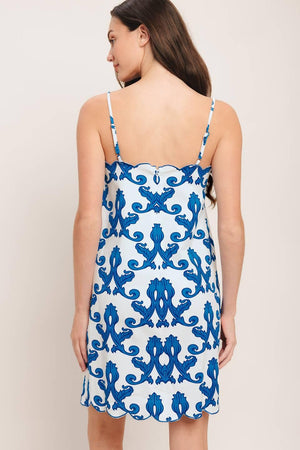 A printed woven mini dress featuring straight neckline, straps, scallop edge and back zipper closure

Details:

Self: 97% Cotton 3% Spandex

Size & Fit

-Model is 5`8" And Wearing Size Small
-Measurements Taken From Size Small
-Approx. Length: 35"