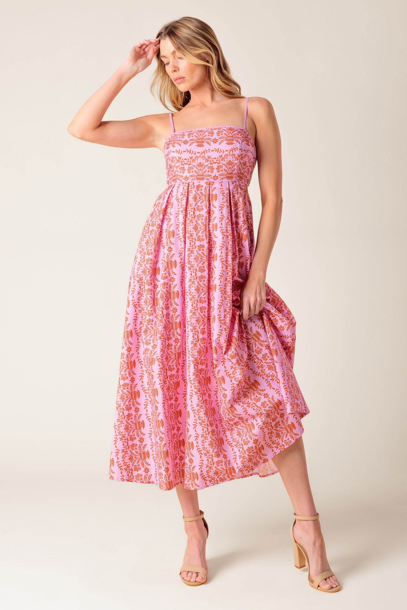 
A printed woven midi dress featuring straight neckline, straps, full skirt and bare back with tie

Details:

Self : 100% Cotton
Lining : 100% Cotton

Size &amp; Fit

- Model is 5`8" And Wearing Size Small
- Measurements Taken From Size Small
- Approx. Length: 50"