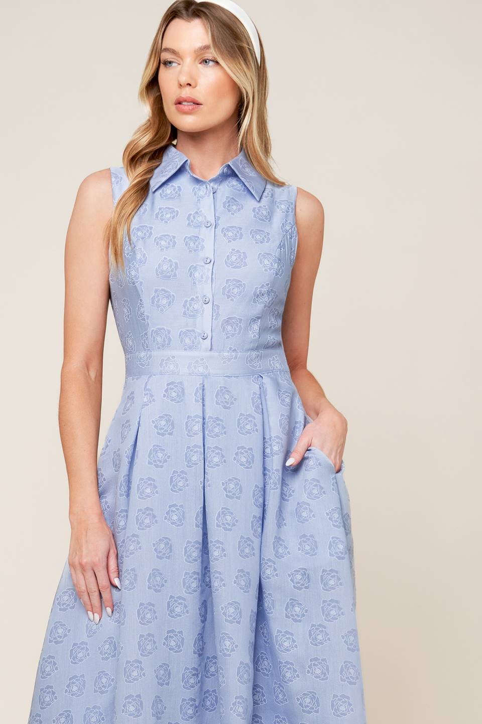 A slate blue woven midi dress featuring collar, button down, inverted pleat full skirt and side zipper closure.